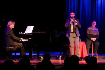 Broadway came to Boothbay on Feb. 14 — to the Opera House — that is. Kevin Kiley played host for the event, as well as musical accompanist for the slate of incredible singers: New York City-based Jeff Funaro (seen above as the horn “section” during some of the performances), John David Adams, far right, Devin Dukes, Jason Hersom and Lynne Mcghee. Courtesy of Robert Mitchell