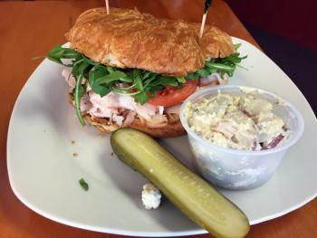 Capers’ special on March 2 was a smoked turkey sandwich with arugula, pear preserve and crumbled blue cheese on a flaky croissant. SUZI THAYER/Boothbay Register