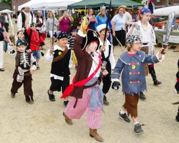Kid Pirates: Hundreds of children participate in the Damariscotta River Pirate Rendezvous, scheduled for June 20 in Damariscotta, helping to take over the town and find the hidden treasure. This group is part of the Pirate Kids Costume Contest. Courtesy of Ellie Busby