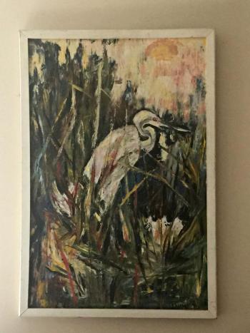 A large painting of an egret done by Frantz's mother.