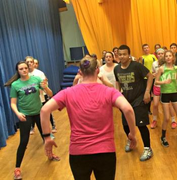 Sarah Gudroe leads a group of high school students in zumba dance during Wellness Day. KATRINA CLARK/Boothbay Register