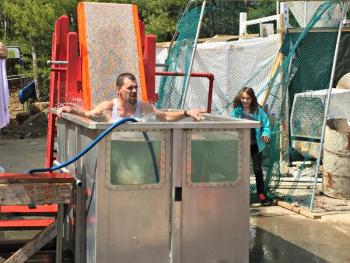 Mara Gentry makes sure David Steinmetz takes a dive. KATRINA CLARK/Boothbay Register