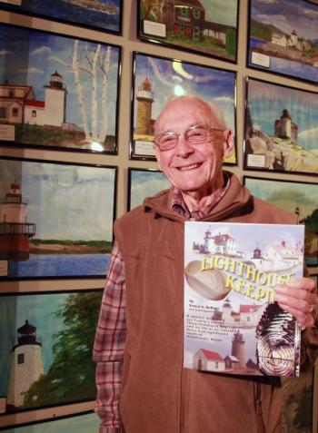 Former lighthouse keeper Ernest DeRaps wrote a book on lighthouse keeping with his wife Pauline. His section of the book is entitled “Lighthouse Keeping,” hers is entitled “Light Housekeeping.” Since he retired at the age of 80, from his third career building houses, he has painted each of Maine’s 65 lighthouses. Courtesy of Alan Crowell/LincolnHealth