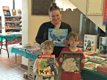 Crystal Clark with her boys Kolton Campbell, right, and Ryder Campbell, left. They each picked out a favorite book and Crystal found a fun bedtime story for her boys. KATRINA CLARK/Boothbay Register