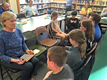 Eight students from the Boothbay Region Elementary School fourth grade class came with Mrs. Kathy Hartley to demonstrate their “mindfulness” exercise. Clockwise from far left: Mrs. Hartley, Mariah Andrews, Dylan Plummer, Sydney Blake, Caden Royal, Callen Eason, Emery Lorrain and Tyler Barter. Not pictured is Meghan Leeman. KATRINA CLARK/Boothbay Register