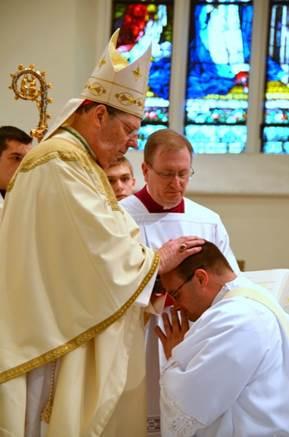 Father Steven Cartwright is ordained to the priesthood by Bishop Robert P. Deeley at the Cathedral of the Immaculate Conception in Portland on Saturday, June 13. Courtesy of Lois Czerniak, Roman Catholic Diocese of Portland