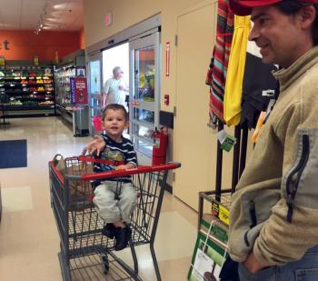 Laurin Suffrian was all smiles and waves as his father wheeled him out of the store. SUZI THAYER/Boothbay Register