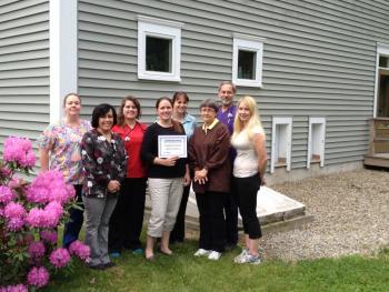 The staff of Boothbay Animal Hospital. From left: Gail Christopher-Gilbert, Lori Buckingham, Dr. Kerri Padgett, Carrie Koskela, Jill Wood, Kathleen Loewe, Dr. Dean Domeyer and Samantha Hicks. Not pictured: Dr. Kellie Wedge and Melissa Bosse. Courtesy of Dr. Kellie Wedge and Melissa Bosse