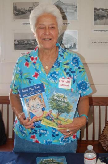 Children’s book publisher Francine McEwen of Manchester with two of her recent titles. ART MAYERS/Boothbay Register