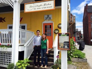 August DeLisle and Torie Van Horne stand on the steps leading up to their Damariscotta restaurant, Van Lloyd’s Bistro. SUZI THAYER/Wiscasset Newspaper