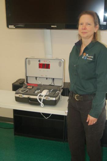 Tara Jones simulates a 911 emergency call. ART MAYERS/Boothbay Register