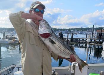 Connor Tagg with his first place striper. Courtesy of Steve Rubicam