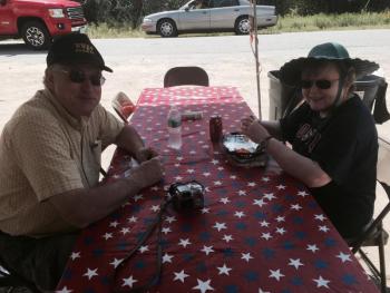 Joe and Kathy Devonshire of Jefferson eat before riding the rails Aug. 9 on day two of a picnic at Wiscasset, Waterville & Farmington Railway Museum in Alna. SUSAN JOHNS/Wiscasset Newspaper Joe Devonshire, Kathy Devonshire