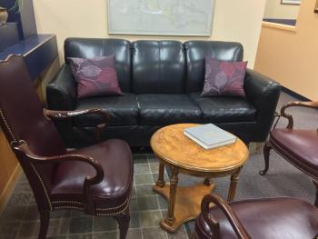 This large, comfortable leather couch and chairs are from the Rotary Club auction. SUZI THAYER/Boothbay Register