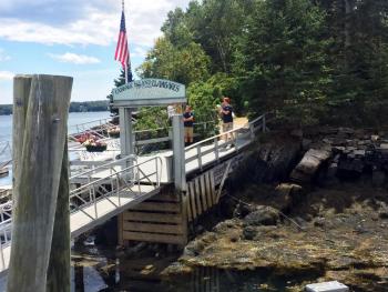 A welcome sign greets passengers as they disembark from the Bennie Alice. SUZI THAYER/Boothbay Register