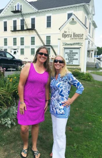 Cathy Sherrill stands next to the Boothbay Harbor Opera House with New England Boating TV’s Parker Kelley. Courtesy of Parker Kelley