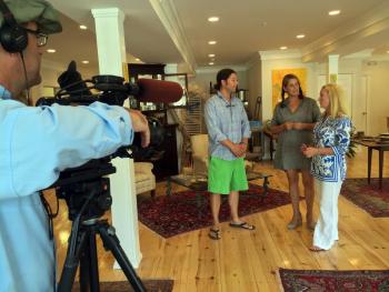 Cameraman and producer of New England Boating TV sets up a scene for an interview at Alison Evans Ceramics in Boothbay Harbor on Sept. 3. Journalist and co-host of the program Parker Kelley, far right is interviewing Chris Fritz and Alison Evans for the show. SUZI THAYER/Boothbay Register