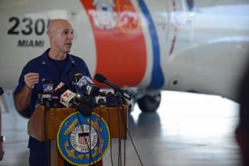 Coast Guard Capt. Mark Fedor answers questions during a press conference at Coast Guard Air Station Miami on Oct. 5, 2015. Fedor is the Coast Guard 7th District chief of response and oversees operations for active search-and-rescue cases. (U.S. Coast Guard photo by Petty Officer 2nd Class Mark Barney)