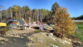 Demolition of the former country club clubhouse, as seen from the new clubhouse. Courtesy of Steve Butler