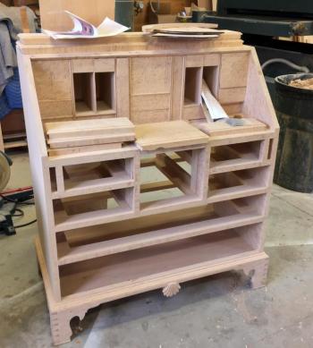 A birdseye maple desk, in the works in Jeff Koopus’ shop, is part of an ongoing commission for a house in Cape Cod that is a veritable museum of Koopus' work. SUZI THAYER/Boothbay Register