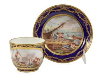 Eighteenth century Sevres porcelain gilt and cobalt blue tea cup and saucer