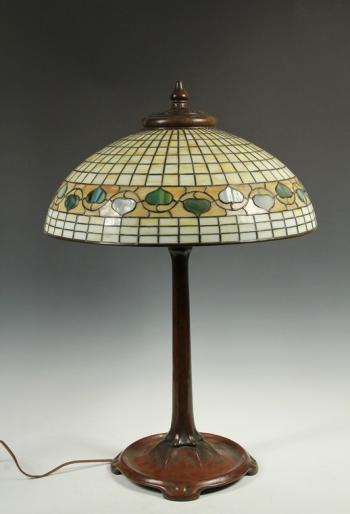 Important Tiffany Studios table lamp with acorn shade and bronze base