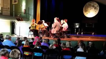 The wind ensemble from the Portland Symphony Orchestra warms up before their rendition of “Peter and the Wolf” for local students. From left: Lisa Hennessy on flute, Stephanie Burk on the oboe, John Bodin of the French horn, Janet Polk on the bassoon, and Tom Parchman on the clarinet. KATRINA CLARK/Boothbay Register