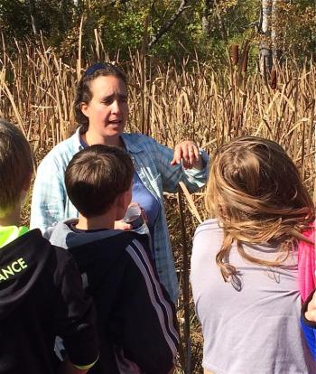 DRA Education Director Sarah Gladu engages Great Salt Bay students in a discussion of traditional uses of cattails during DRA’s Wabanaki Living Skills and Culture Program. Courtesy photos