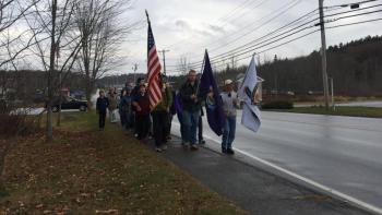 On Townsend Avenue, students begin the march around town in the rain on Nov. 11. KATRINA CLARK/Boothbay Register