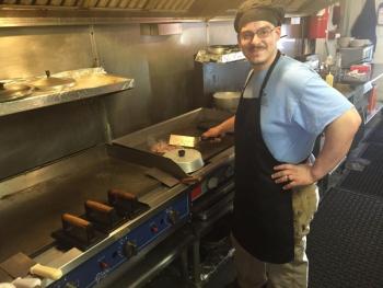 Miss Wiscasset Diner chef James Murray tends the grill. SUSAN JOHNS/Wiscasset Newspaper