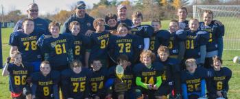 The 2015 Boothbay Region Youth Football grade 5 and 6 team. Pictured from left are, back row: Coach Joe Hall, Coach Brad Drummond, Jordan Carrier, Coach Jason Barter, Coach Trevor Swope; middle row: Caden Royal, Jake Kelley, Matthew Sullivan, Athenase Lawless, Riley Faulkingham, Gavin Dolloff, Quincy Coombs, Paul Holbrook, Moses Allen, Zachary Rollins; front row: Damien Torrre, Tyler Barter, Sean Marston, Grant Swope, Ashton McLellan, Gavin Carlson, Connnor Wenners, Hunter Brewer and Dylan Plummer. Courtesy of Lynch Sports Photography