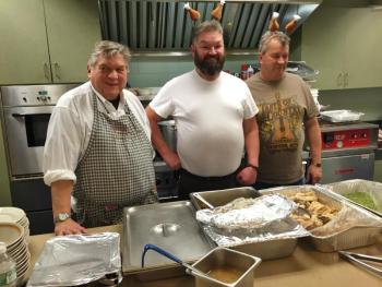 Ernie Card, left, of Bremen, Bob MacDonald of Wiscasset and Brian Bolduc of Edgecomb volunteer at a Thanksgiving meal at Wiscasset Community Center Nov. 26. SUSAN JOHNS/Wiscasset Newspaper