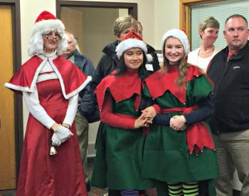 Mrs. Claus with her two helper elves, Lovely Uberita and Sierra Murray. KATRINA CLARK/Boothbay Register