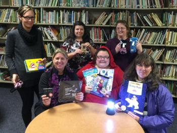 The Boothbay Region Elementary PTO spent part of their Nov. 30 meeting going through boxes of merchandise for their Holiday Store, which will be open in the BRES lobby from December 7 through the 11th. Pictured from left, bottom row: president Mary Baudo, vice president Nikki Main, and treasurer Sharon Machon-Ames; top row: PTO members Katie Carver, Sarah Brewer, and Anna Giles. Not pictured: secretary Tatsiana Hughes. KATRINA CLARK/Boothbay Register
