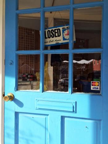 Closed signs in doors are a common sight around town in the winter. SUZI THAYER/Boothbay Register