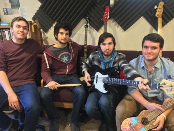 The band, Hollis Woods, featuring, from left, Evan Welch, Ben Lev, Levon Ritter and Ben Betts, wrap up their recording session at Frog Hollow Studio in Brunswick on Jan. 14. SUZI THAYER/Boothbay Register