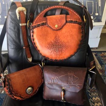 Some of the bags that Peter Dombrowski makes. All are hand-sewn and tooled. SUZI THAYER/Boothbay Register