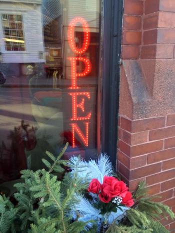 A sign in Janson’s Clothing window. SUZI THAYER/Boothbay Register