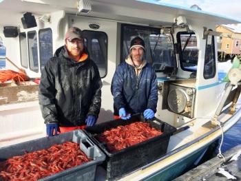 Bill Sherburne, right, and sternman Zak L’Heureux brought in a pretty good catch on Feb. 9. SUZI THAYER/Boothbay Register