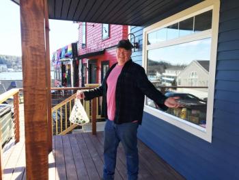 Don Kingsbury, owner of Two Salty Dogs, shows off some of the new digs he’ll be offering for lease this summer. SUZI THAYER/Boothbay Register