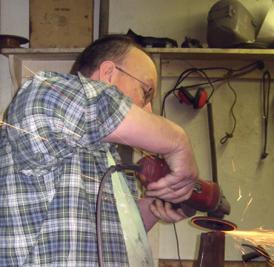 The Boothbay Railway Village is restoring a historic Maine locomotive and volunteers are invited to assist. Volunteer Bruce Bowler pictured here preparing components that were removed from S.D. Warren Co. locomotive No. 2’s frame for eventual reinstallation. The first volunteer work day is scheduled for Saturday, Feb. 27 from 9 a.m. to 3 p.m. Courtesy photo