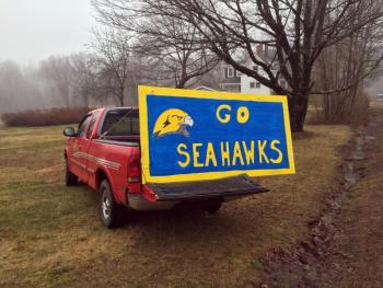 A sign on the back of John Leonard’s pickup truck on Route 27 in Boothbay. SUZI THAYER/Boothbay Register
