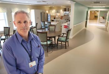 St. Andrews Executive Director Loriman Looke stands near nurse’s station at the Zimmerli Pavilion. Courtesy of Scott Shott