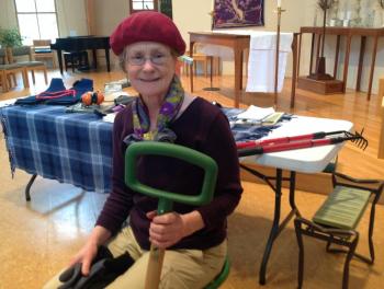 Ellen Gibson from Maine AgrAbility demonstrates some assistive technology for gardening at the March 9 meeting of the Boothbay Region Garden Club. Gibson is sitting aboard a rolling swivel chair and holding a wide handled shovel designed specifically for women. Among other helpful tools there is a garden bench that doubles as a kneeling pad when turned upside down and a telescoping rake and hoe. Courtesy of Linda Redman