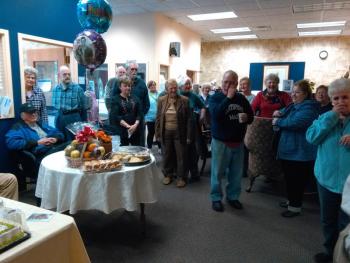 Volunteers and guests at the April 2 community center “thank you Jane Good” party. JANE CARPENTER/Boothbay Register