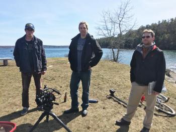 Cody Mitchell, left, Ryan Leighton and Brian Papineau, the production team behind the Boothbay-based online television series Era Man, prepare to shoot a scene on a recent afternoon at Barrett’s Park in Boothbay Harbor. The trio has recently completed the third episode of the coming of age show and plan to film six in total. SUZI THAYER/Boothbay Register