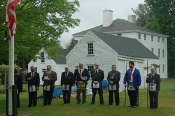 Dresden Masons stand at attention as the flag is raised in Dresden. ART MAYERS/Wiscasset Newspaper