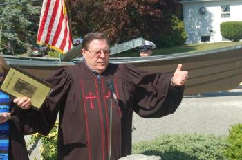 Methodist Minister Richard Rego delivers the invocation. ART MAYERS/Boothbay Register
