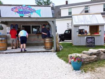 The “Bet’s Fish Fry Compound,” now includes a lemonade stand run by her grandchildren, Natalie and Shawn Gamage. SUZI THAYER/Boothbay Register
