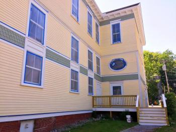 The work began in early February to repaint, and partially restore the north side of the historic building. SUZI THAYER/Boothbay Register